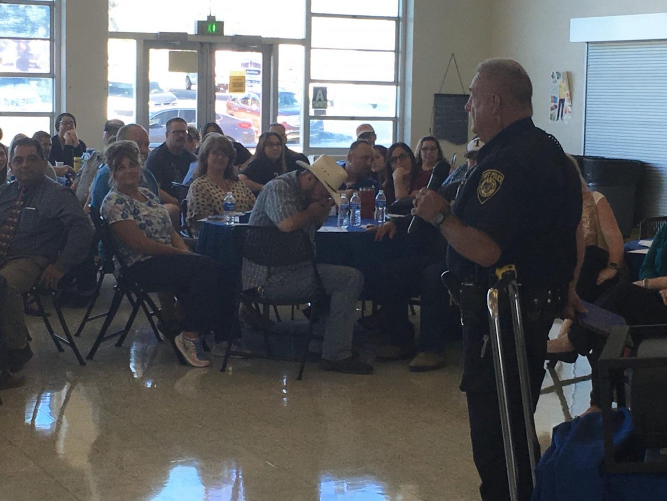 Officer Miller addresses faculty and staff