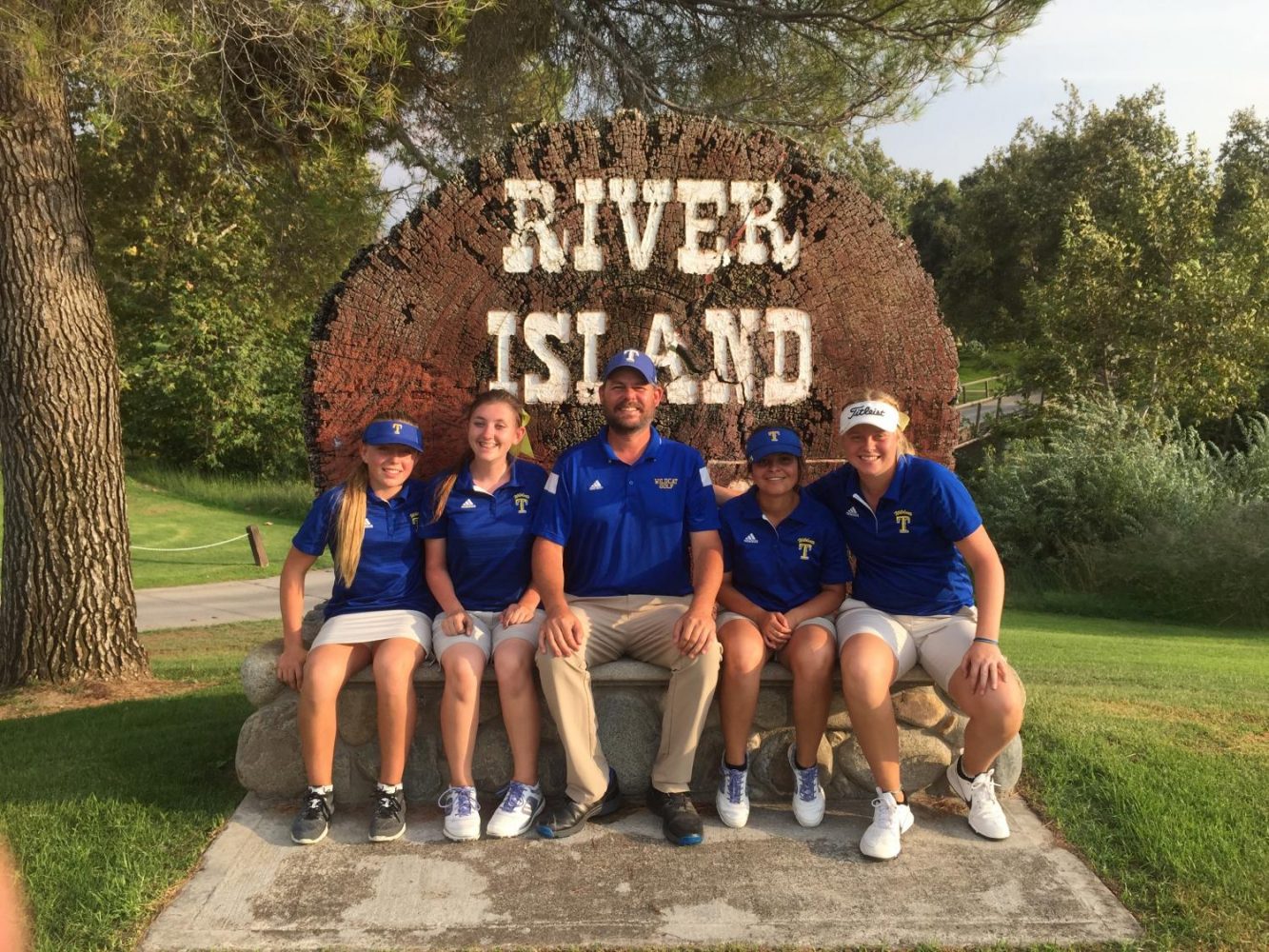 Girls Golf team players competing at River Island non-league tournament.