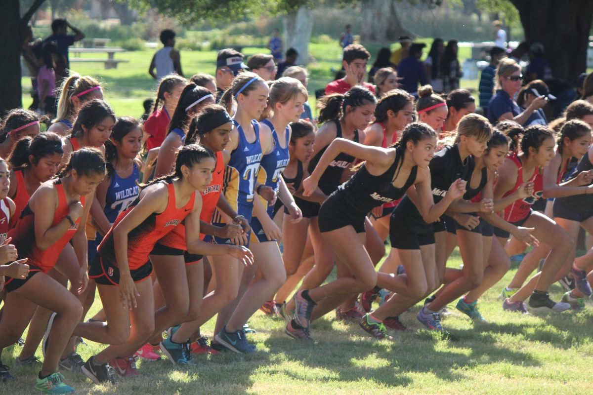 Girls varsity team taking off when the race started at Avocado Lake.