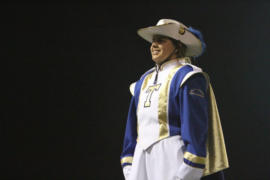 Drum Major Angie Self conducts the show and leads the band.