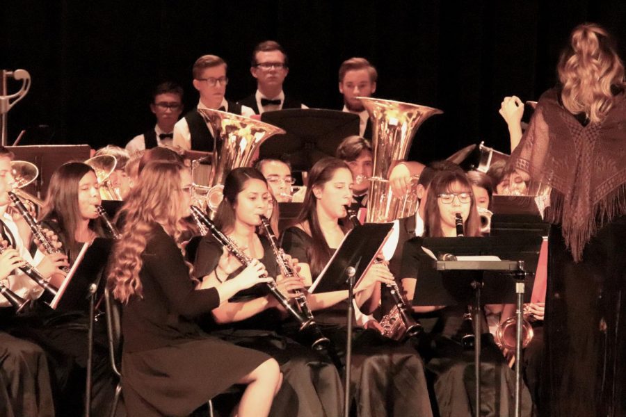 The concert band conducted by Amanda Posey