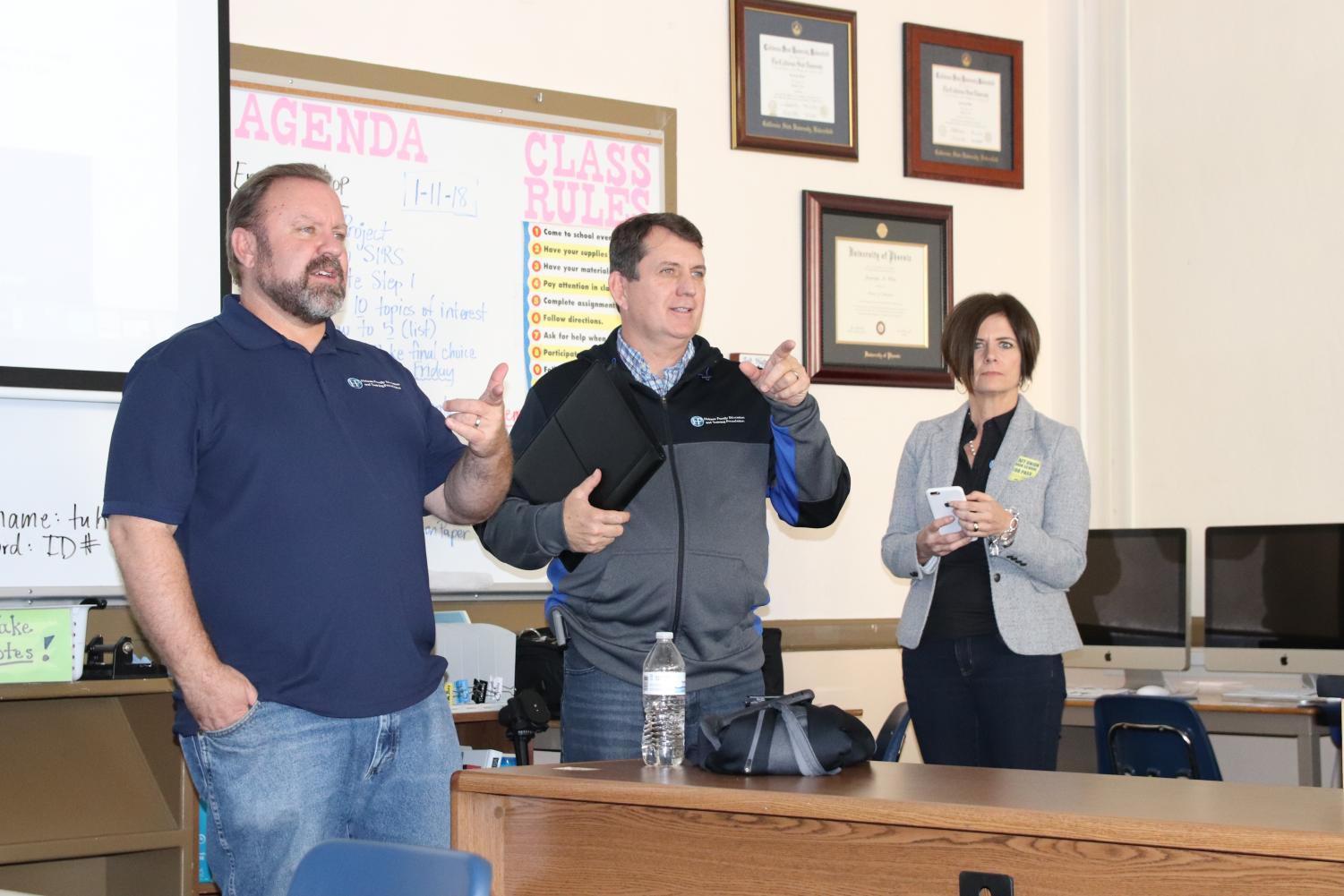 Left to right: John Kopp, Dave Buck, and Gretchen Daughtery present the Holmes Family Education and Training Foundation information to Taft High seniors.