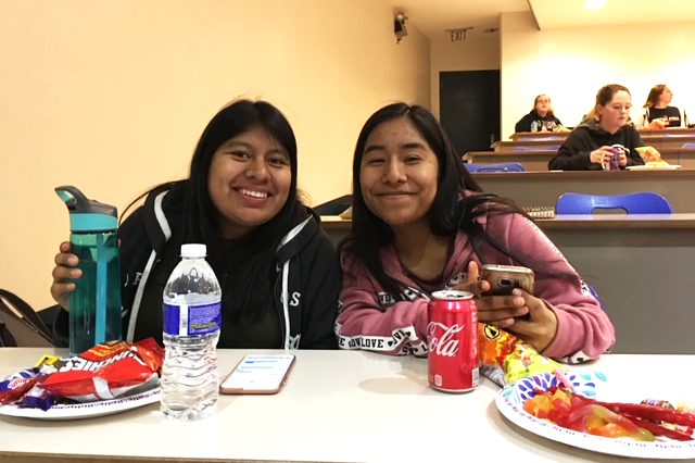 Rosa Silva and Delfina Ojeda attending the event with some snacks.