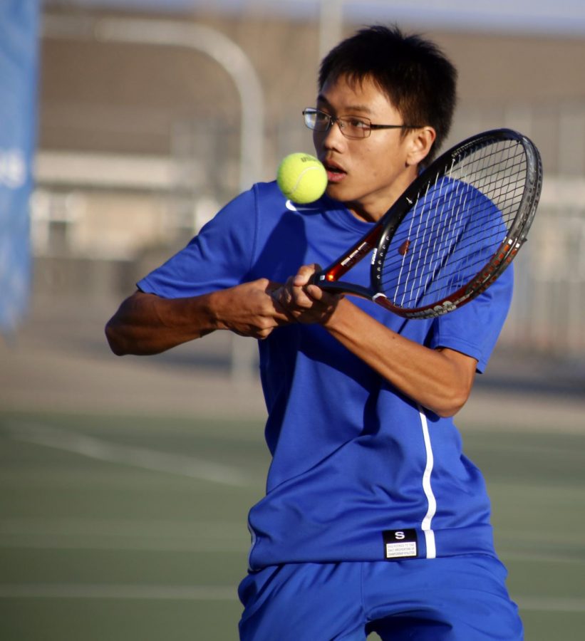Tyler Nguyen volleys at net in his doubles win against Frontier there Tuesday. He was the only Taft player to win his singles and doubles matches against BCHS Thursday.
