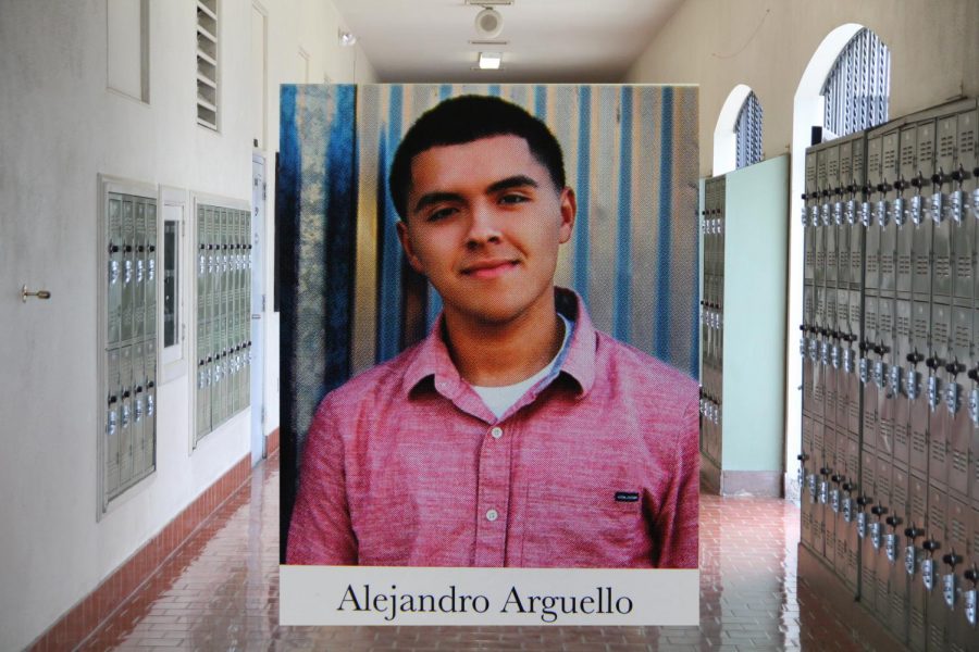 Alejandro Arguellos yearbook photo (Class of 2016) placed over the main building hall.