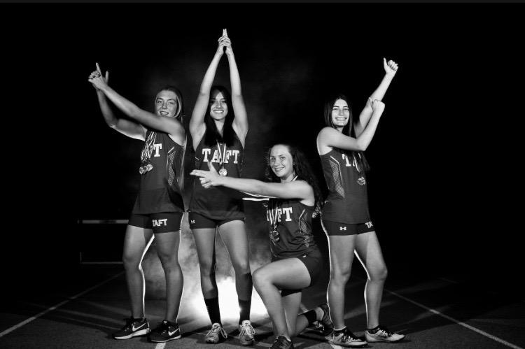 Macayla Wells, Mariah Nevarez, Macayla Wells, Bree Johansen, and Taylor Hale (4x400 relay team) pose for a picture before leaving for Masters.