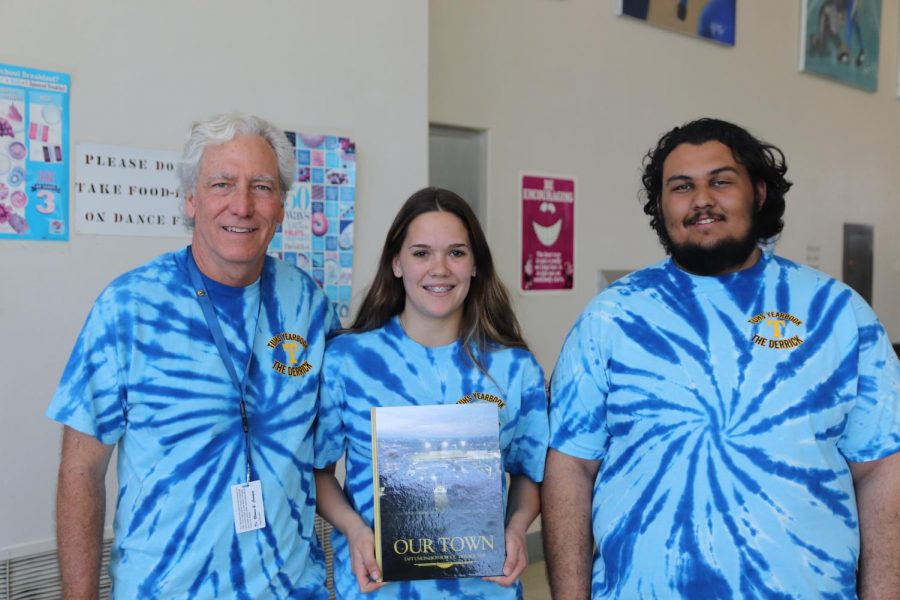 2017-18 Yearbook Adviser Jim Carnal with Editors Hunter Everson and Carlos Margis holding this years book