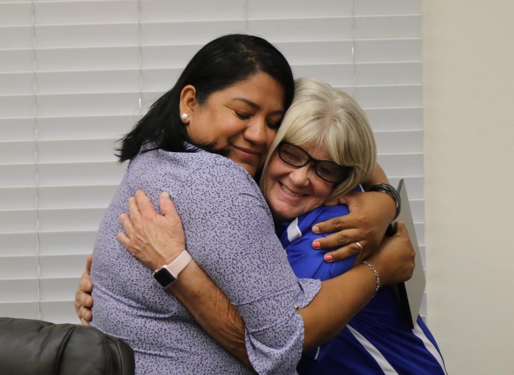 Hugging one last time. Monica Torro awards Mary Miller with a plaque for her many years of service at TUHS. Miller spent 12 years working as campus supervisor. In total she has worked around 33 years doing various jobs. Miller stated,