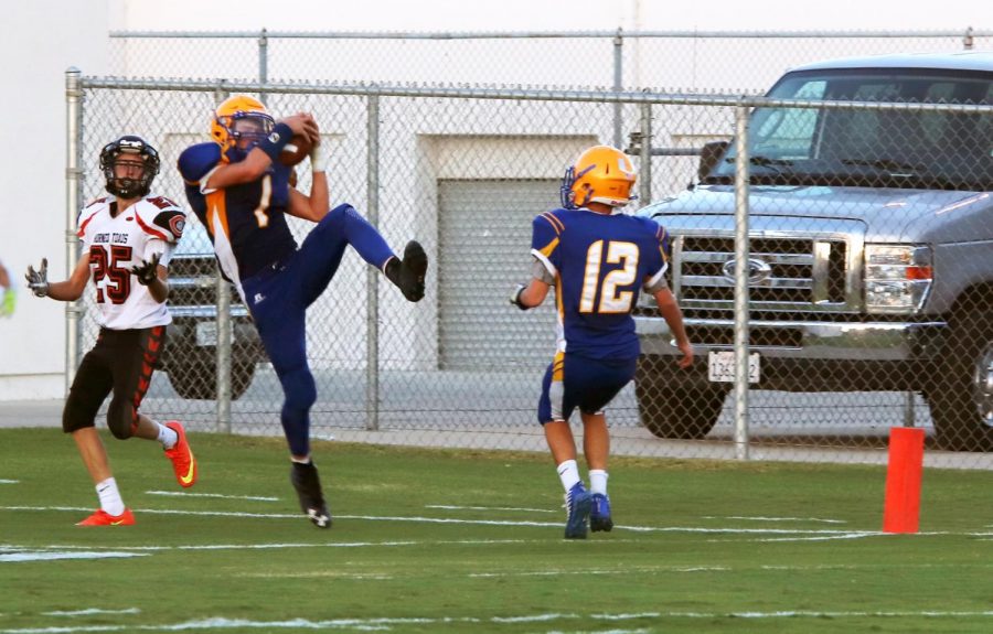 Chad Berry intercepts a pass late in the game preventing the Horned Toads from scoring. Taft beat Coalinga 19-7.