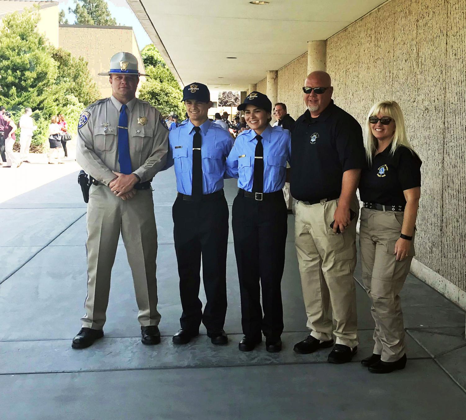 Accomplishing their goals. Lieutenant Michael White and sergeant Reagan Montgomery smiling proudly after the week long academy. Those standing alongside them are Officer Adam Taylor, Tommy White, and Korina Rawls. Tommy White proudly says,