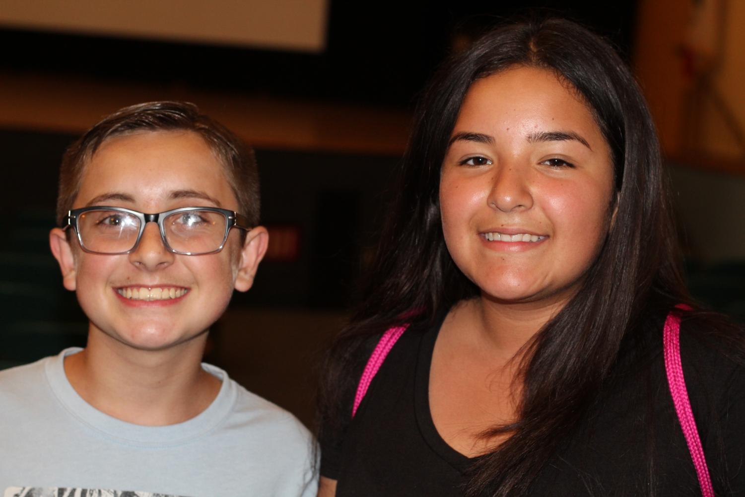 Freshmen Mason Stepp and Laura Perez grabbing a bag of popcorn and on their way to enjoy the movie, Jumanji.