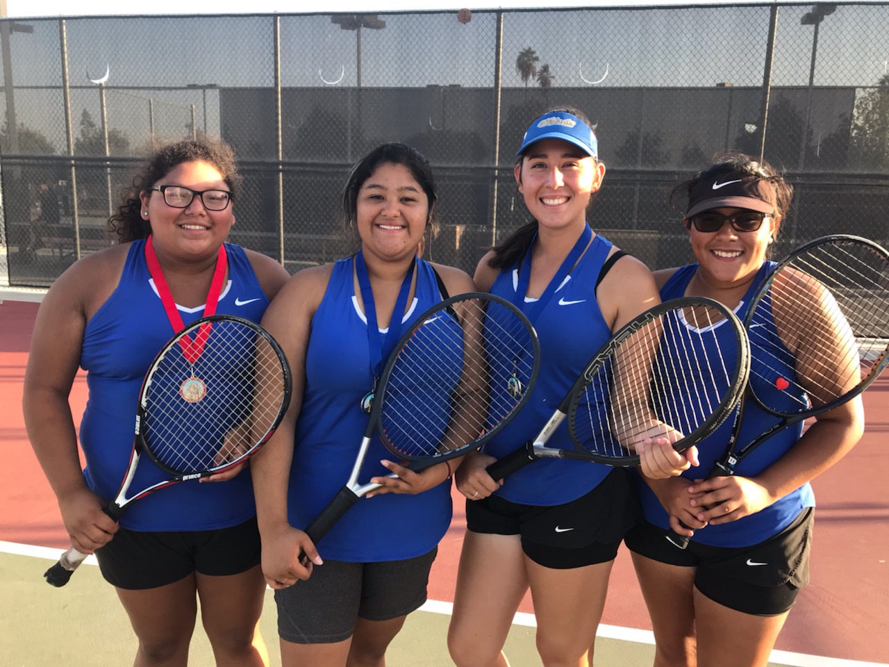 Taft for the win. Valerie Munoz, Cielo Woggn, Diana Huizar, and Jessica DeLaCruz are all excited about their win. This was the second time that the Taft High varsity team won the SSL Championship in the league's 54 history.