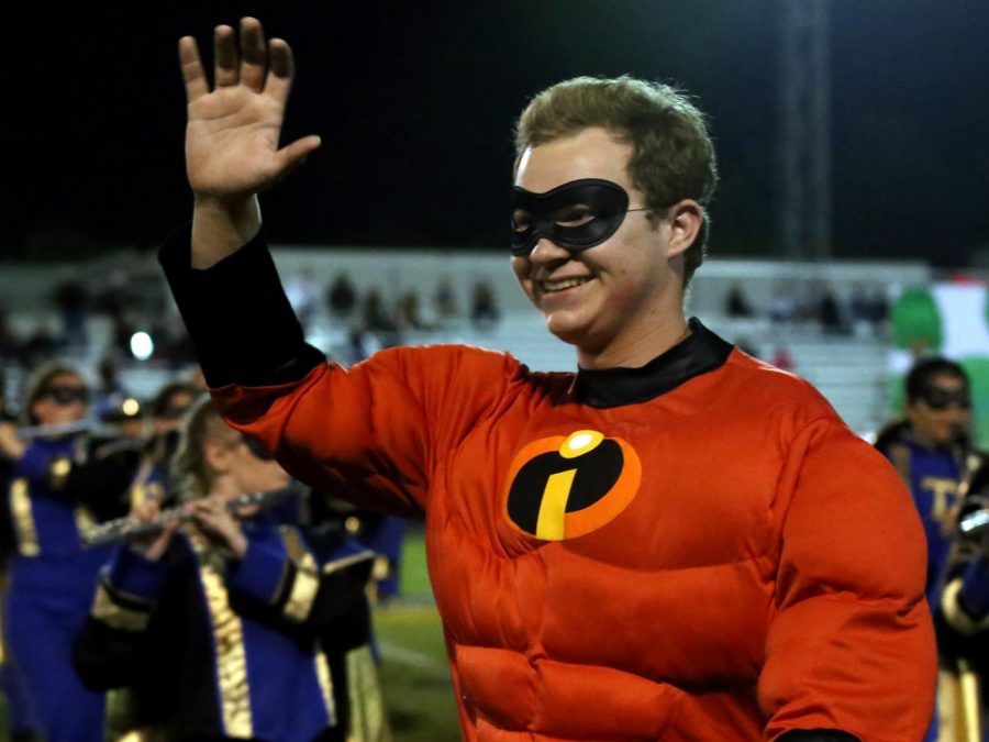 Tanner Ashmore as Mr. Incredible waving at adoring fans. If students or staff would like to see the band’s display, some upcoming events are as listed: November 10th Stockdale competition and
Christmas parade on December 11th. Onlooker, Thalia Villanueva says, The show is humorous, action-filled, and energetic.
