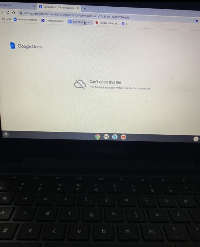 Computer with screen saying, Cant open file